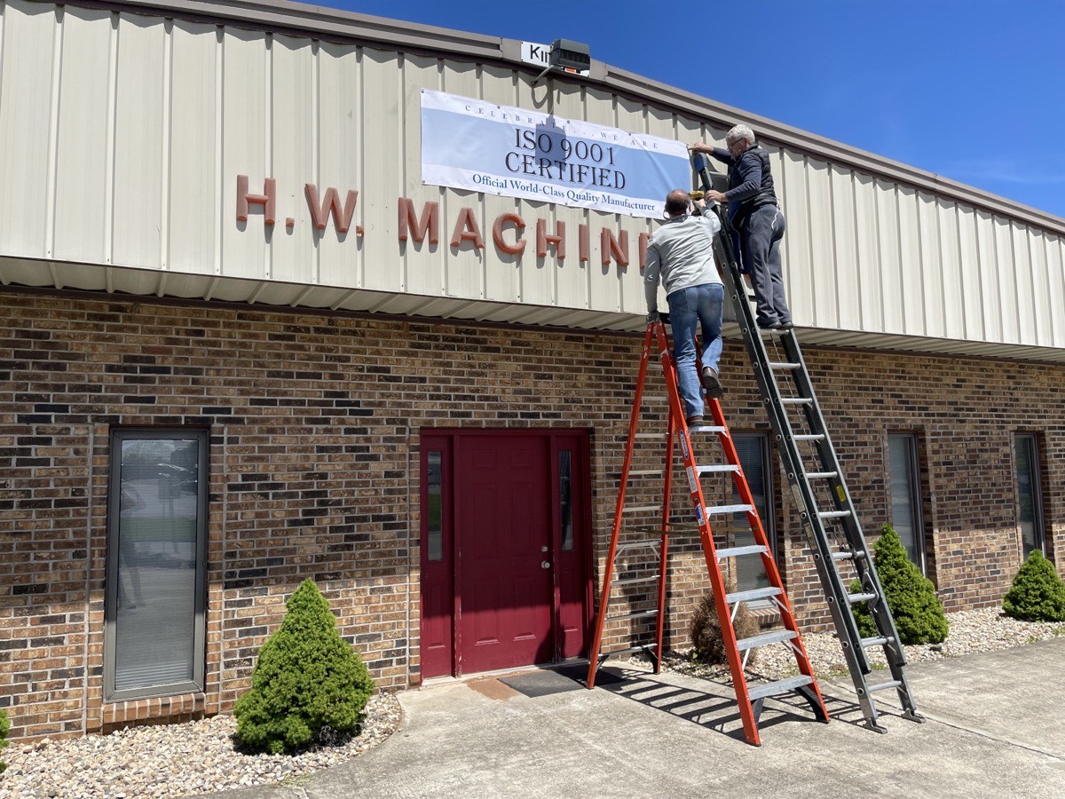 H. W. Machine team celebrating ISO certification